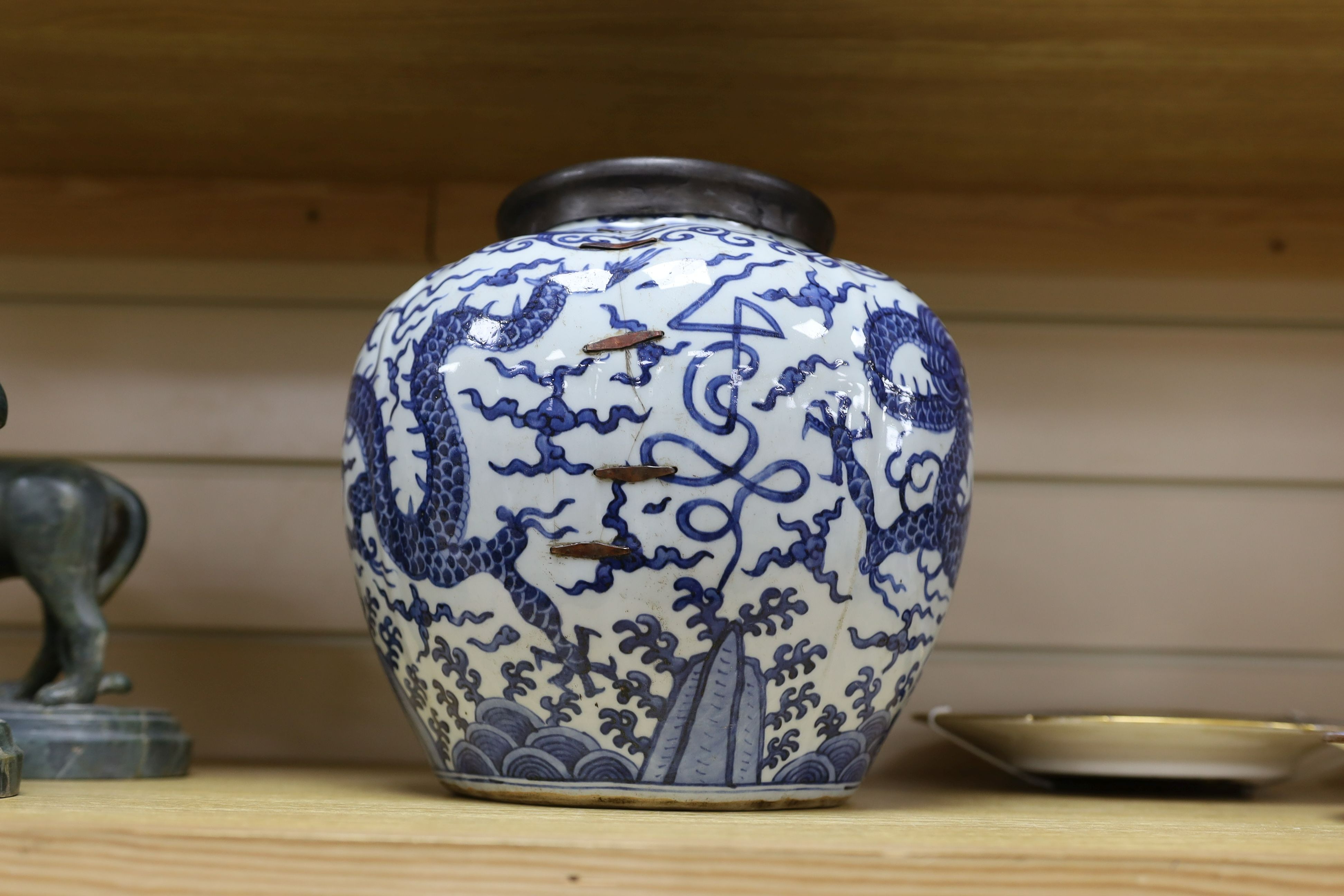 A Chinese blue and white ‘dragon jar, Wanli mark and possibly of the period, 23 cm high